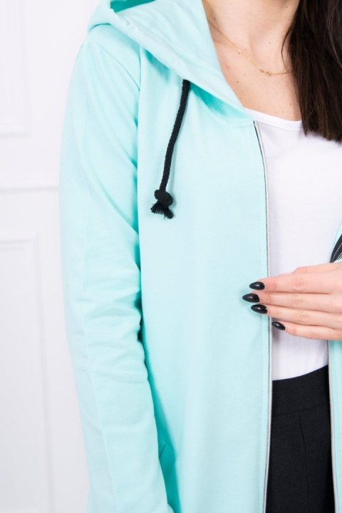 Bluza miętowa do kolan z kieszeniami – pastelowa stylizacja casual