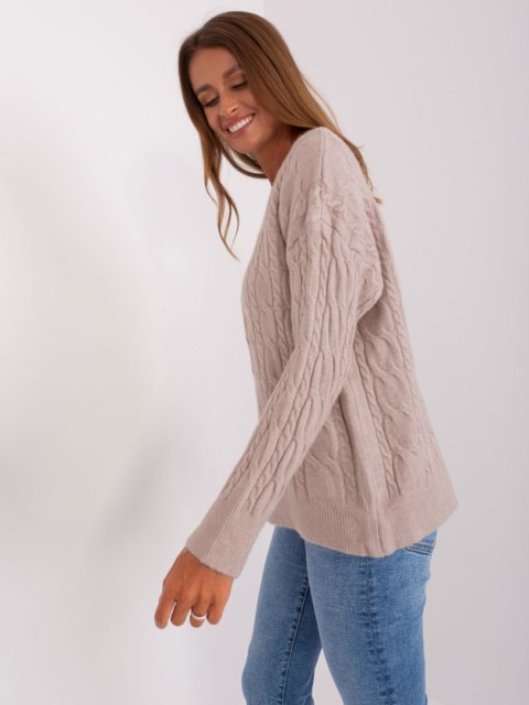 Sweter damski beżowy z warkoczami i ściągaczami oversize Sweter damski beżowy z warkoczami i ściągaczami oversize