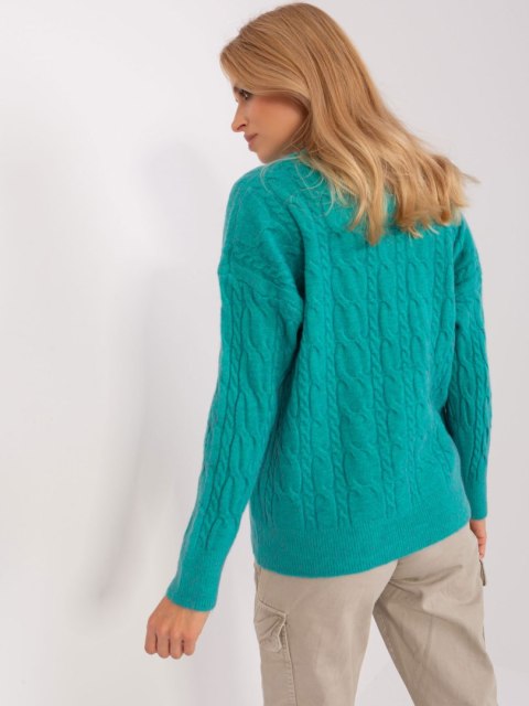 Sweter damski niebieski z warkoczami i ściągaczami oversize Sweter damski niebieski z warkoczami i ściągaczami oversize