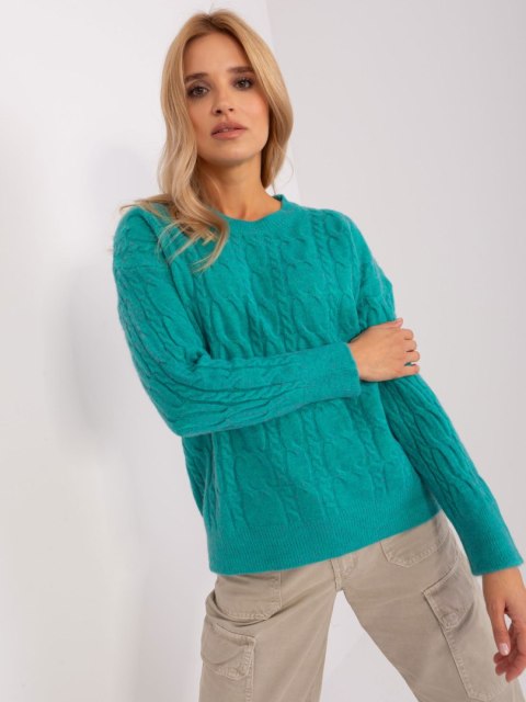 Sweter damski niebieski z warkoczami i ściągaczami oversize Sweter damski niebieski z warkoczami i ściągaczami oversize