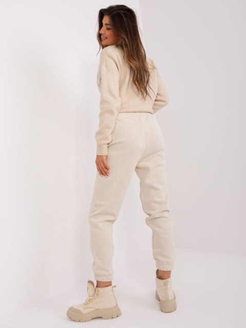 Spodnie dresowe D10047O62214B4 jasny beżowy M