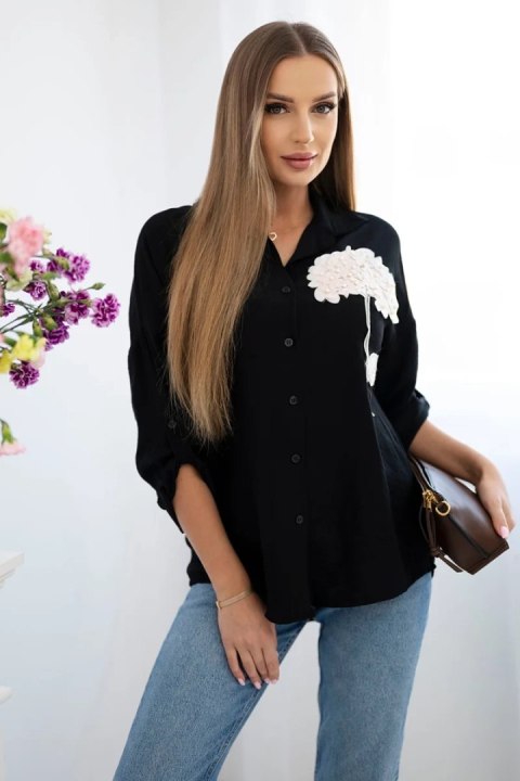Koszula oversize, czarna z kwiatowym akcentrm, regulowany rękaw Koszula oversize, czarna z kwiatowym akcentrm, regulowany rękaw