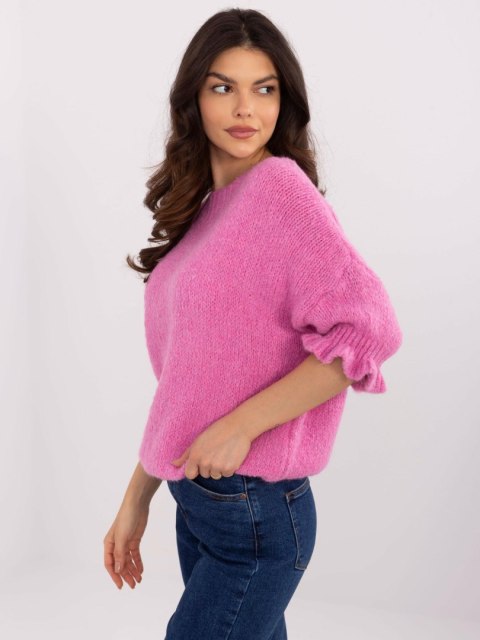 Sweter oversize różowy z krótkim rękawem i falbanką Sweter oversize różowy z krótkim rękawem i falbanką