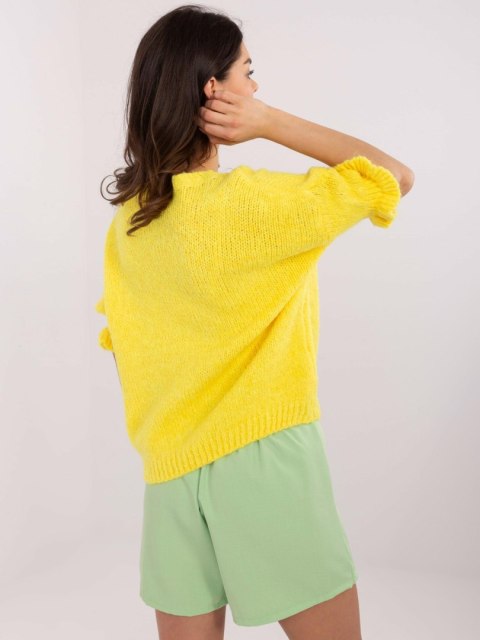 Sweter oversize żółty z krótkim rękawem i falbanką