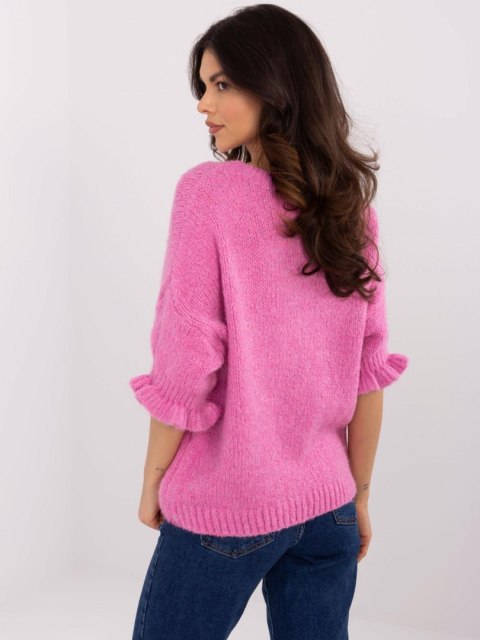 Sweter oversize różowy z krótkim rękawem i falbanką Sweter oversize różowy z krótkim rękawem i falbanką