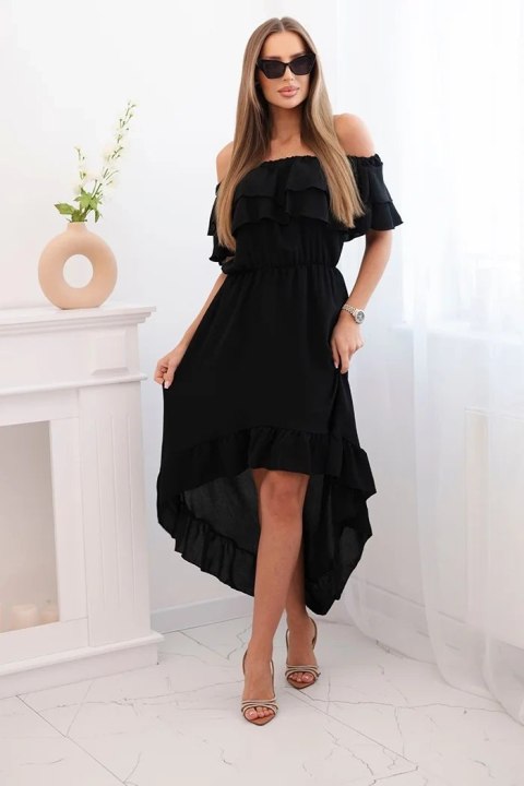 Modelka w czarnej sukience hiszpance z falbanami i dłuższym tyłem – klasyczny, elegancki look na lato Modelka w czarnej sukience hiszpance z falbanami i dłuższym tyłem – klasyczny, elegancki look na lato