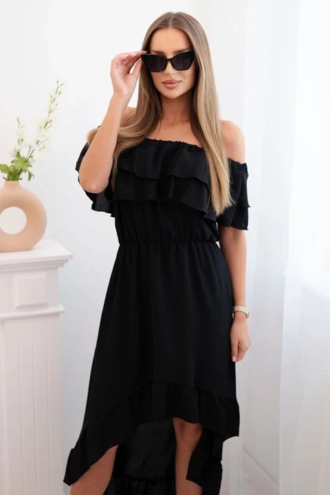 Modelka w czarnej sukience hiszpance z falbanami i dłuższym tyłem – klasyczny, elegancki look na lato Modelka w czarnej sukience hiszpance z falbanami i dłuższym tyłem – klasyczny, elegancki look na lato