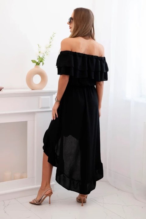 Modelka w czarnej sukience hiszpance z falbanami i dłuższym tyłem – klasyczny, elegancki look na lato Modelka w czarnej sukience hiszpance z falbanami i dłuższym tyłem – klasyczny, elegancki look na lato