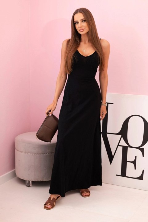 Kobieta w czarnej letniej sukience maxi – Stylowy Wieszak Kobieta w czarnej letniej sukience maxi – Stylowy Wieszak
