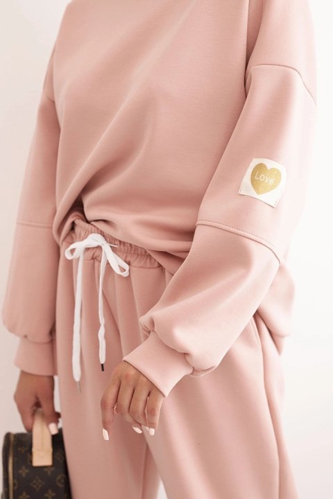 Różowa bluza oversize i spodnie z troczkiem – komplet damski