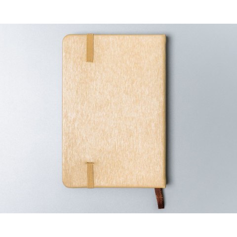 Beżowy notes w formacie A6 zadrukowany w kropki, wyposażony w gumkę zamykającą - Peterson