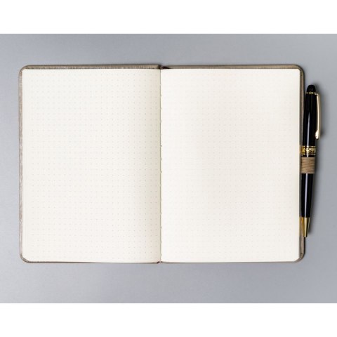 Beżowy notes w formacie B6 zadrukowany w kropki, wyposażony w gumkę zamykającą - Peterson