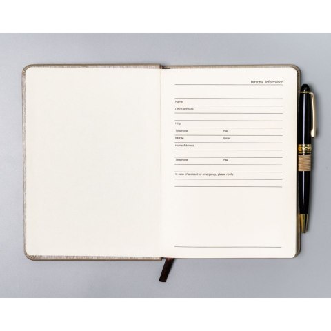 Beżowy notes w formacie B6 zadrukowany w linie, wyposażony w gumkę zamykającą - Peterson