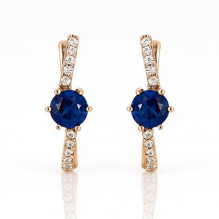 Pozłacane kolczyki ze stali szlachetnej z niebieską cyrkonią KST3498