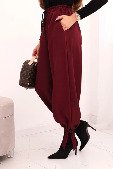 Spodnie damskie z szeroką nogawką i wiązaniem u dołu – Bordowe | Stylowy Wieszak