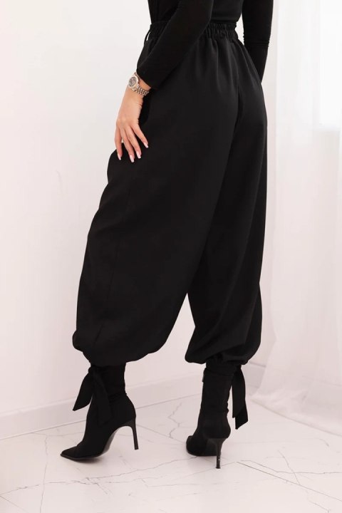 Spodnie damskie z szeroką nogawką i wiązaniem u dołu – Czarne | Stylowy Wieszak