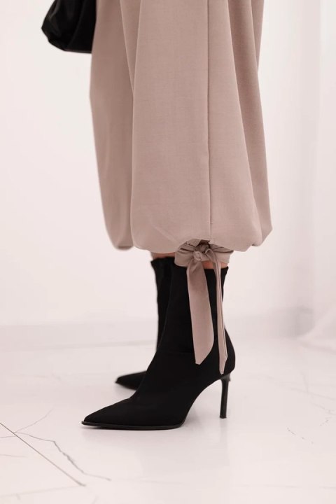 Spodnie damskie z szeroką nogawką i wiązaniem u dołu – Fango | Stylowy Wieszak