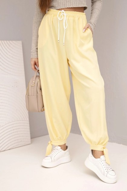 Spodnie damskie z szeroką nogawką i wiązaniem u dołu – żółte, produkcja włoska
