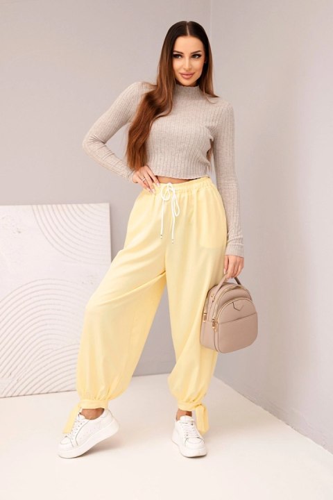 Spodnie damskie casual żółte z wiązaniem u dołu nogawek