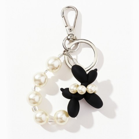 Brelok piesek pudel z perełkami jako ozdoba do torebki