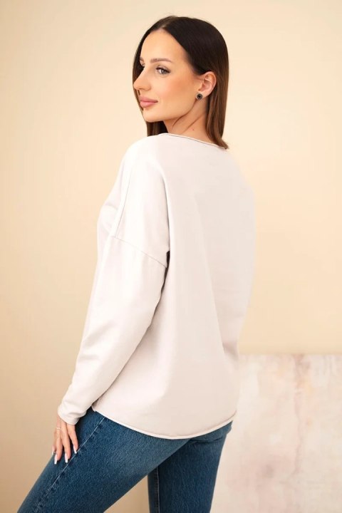 Stylowa bluzka damska z haftowanymi kwiatami – casual