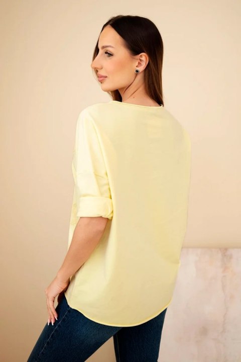 Żółta bluzka damska z bawełny – codzienna stylizacja
