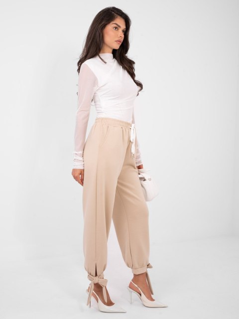 Beżowe spodnie dresowe damskie casual do pracy i na co dzień
