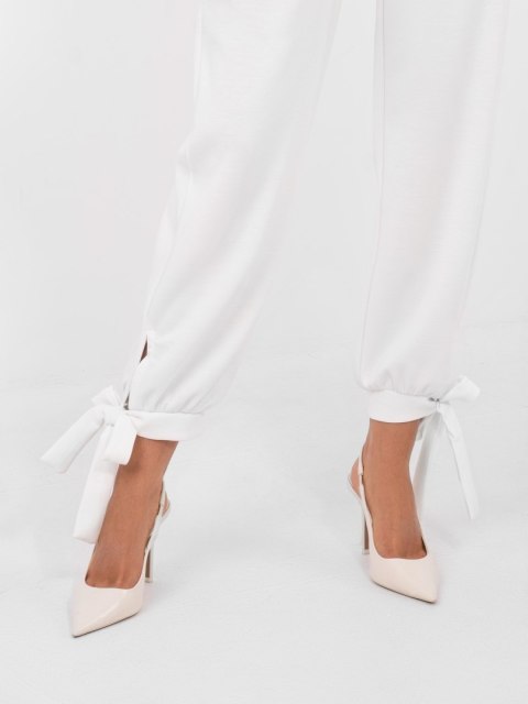 Ecru spodnie joggery damskie ze ściągaczami przy nogawkach