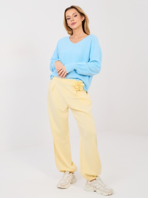 Pastelowe żółte spodnie dresowe damskie joggery ITALY MODA