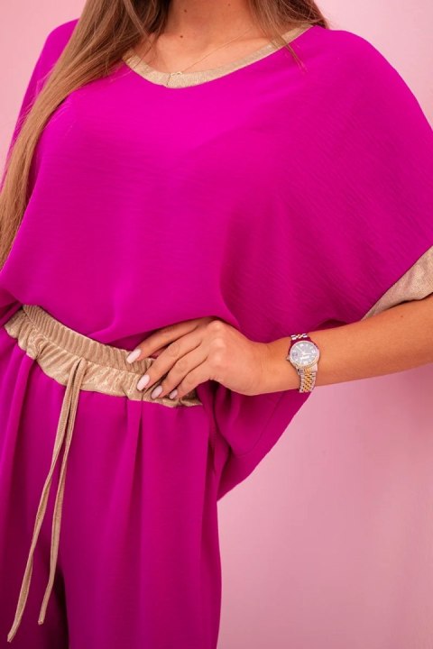 komplet damski fioletowy detal materiału i złotego wykończenia