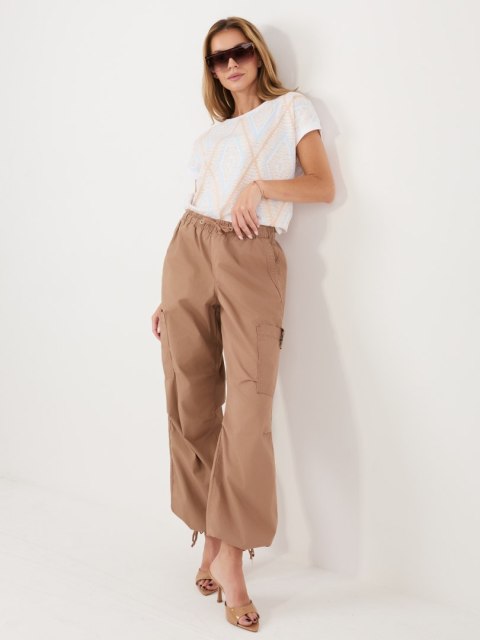 bluzka damska letnia beżowa lekka przewiewna stylizacja