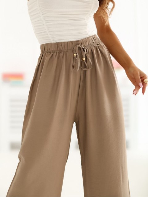 spodnie damskie beżowe letnie szerokie nogawki