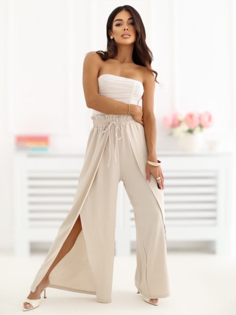 modne spodnie damskie beżowe luźne na lato styl casual