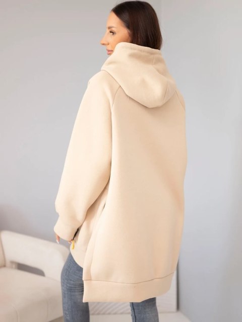 Beżowa bluza oversize z długimi rękawami zakończonymi ściągaczami
